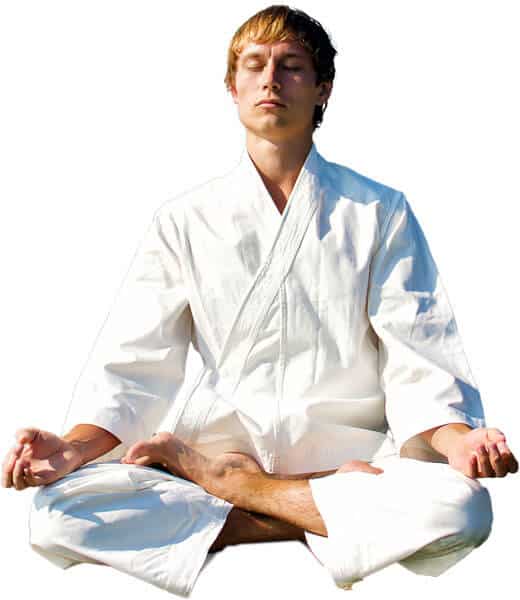 Martial Arts Lessons for Adults in Burlington NJ - Young Man Thinking and Meditating in White