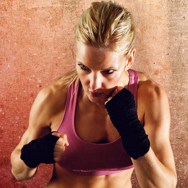 Mixed Martial Arts Lessons for Adults in Burlington NJ - Lady Kickboxing Focused Background